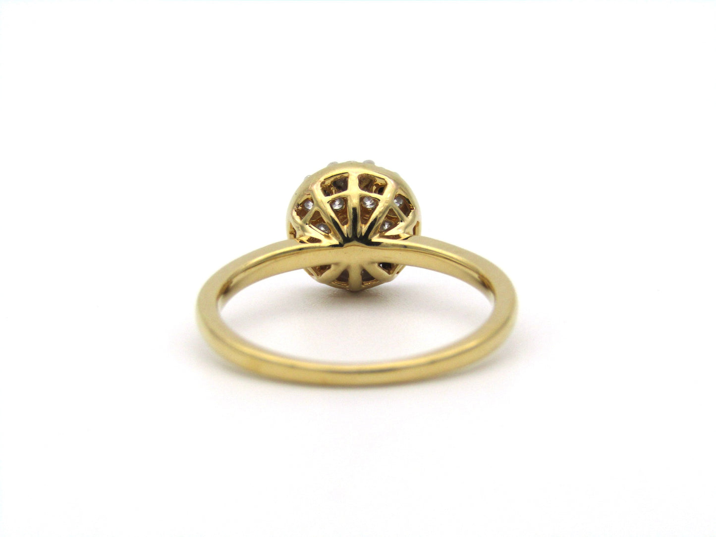18K gold diamond cluster ring.