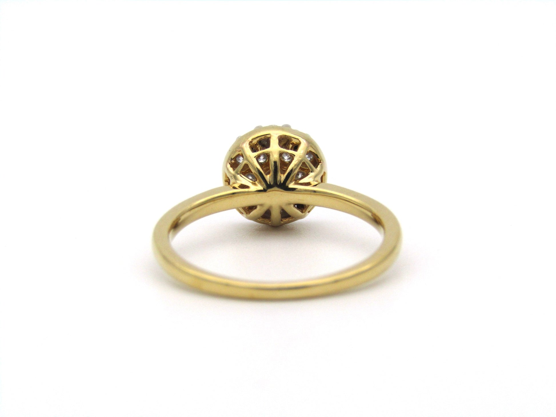 18K gold diamond cluster ring.