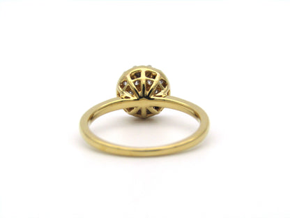 18K gold diamond cluster ring.