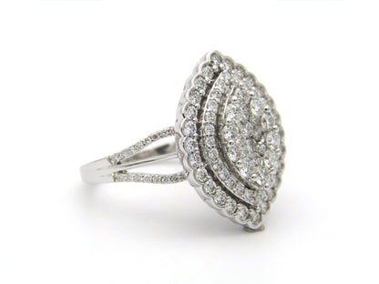 18K gold diamond cluster ring.