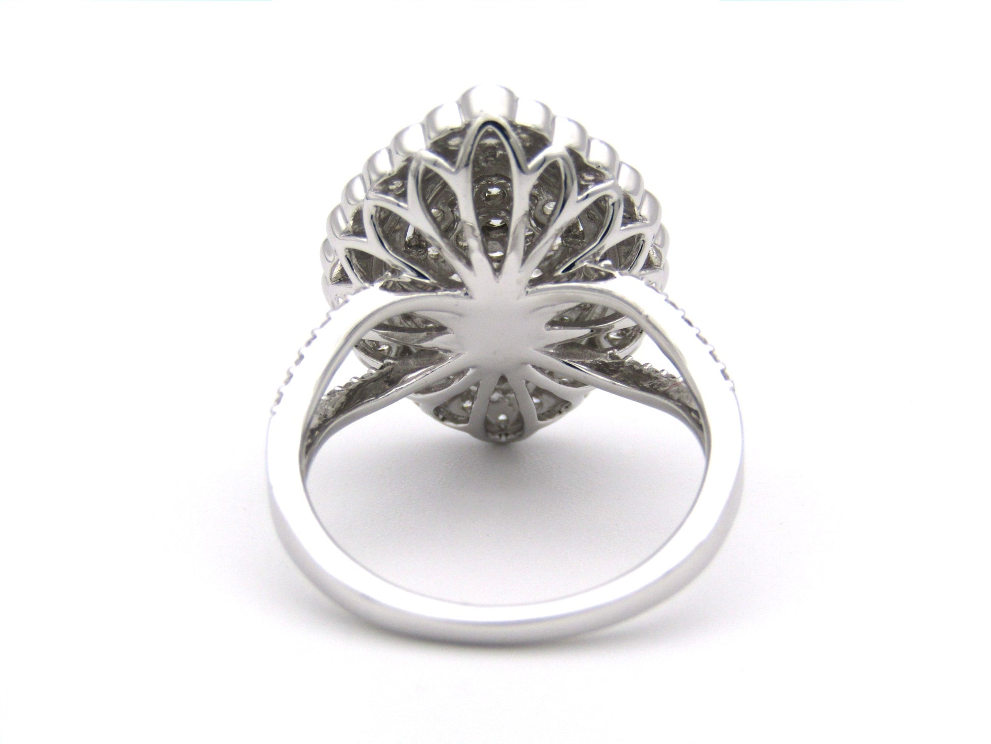 18K gold diamond cluster ring.