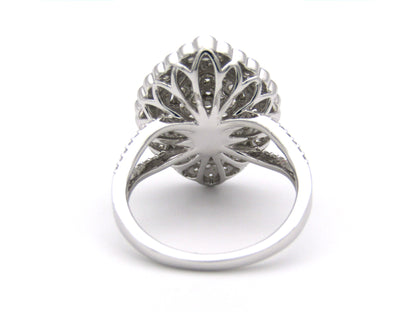 18K gold diamond cluster ring.