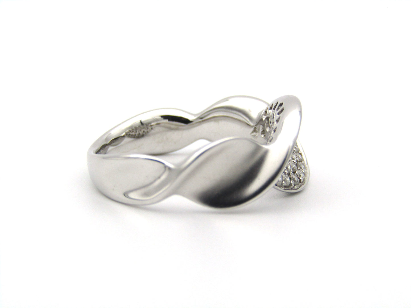 18K gold twist diamond ring.