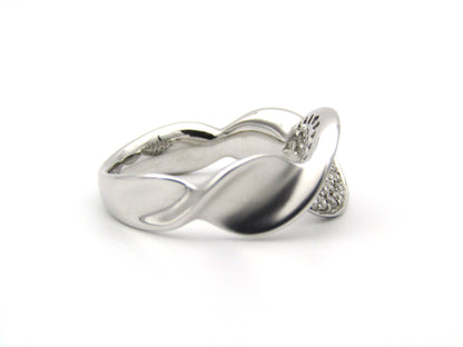18K gold twist diamond ring.