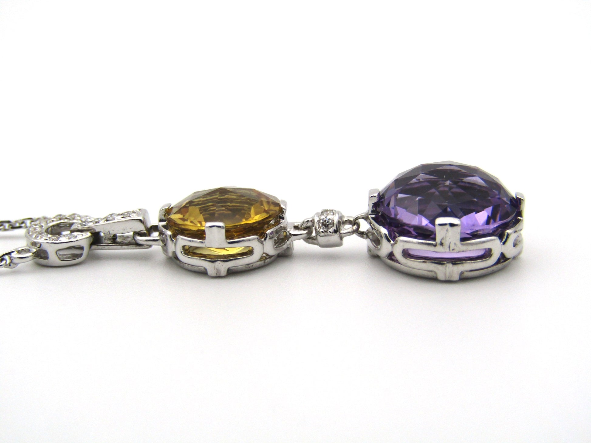 18K gold amethyst, citrine, and diamond necklace.