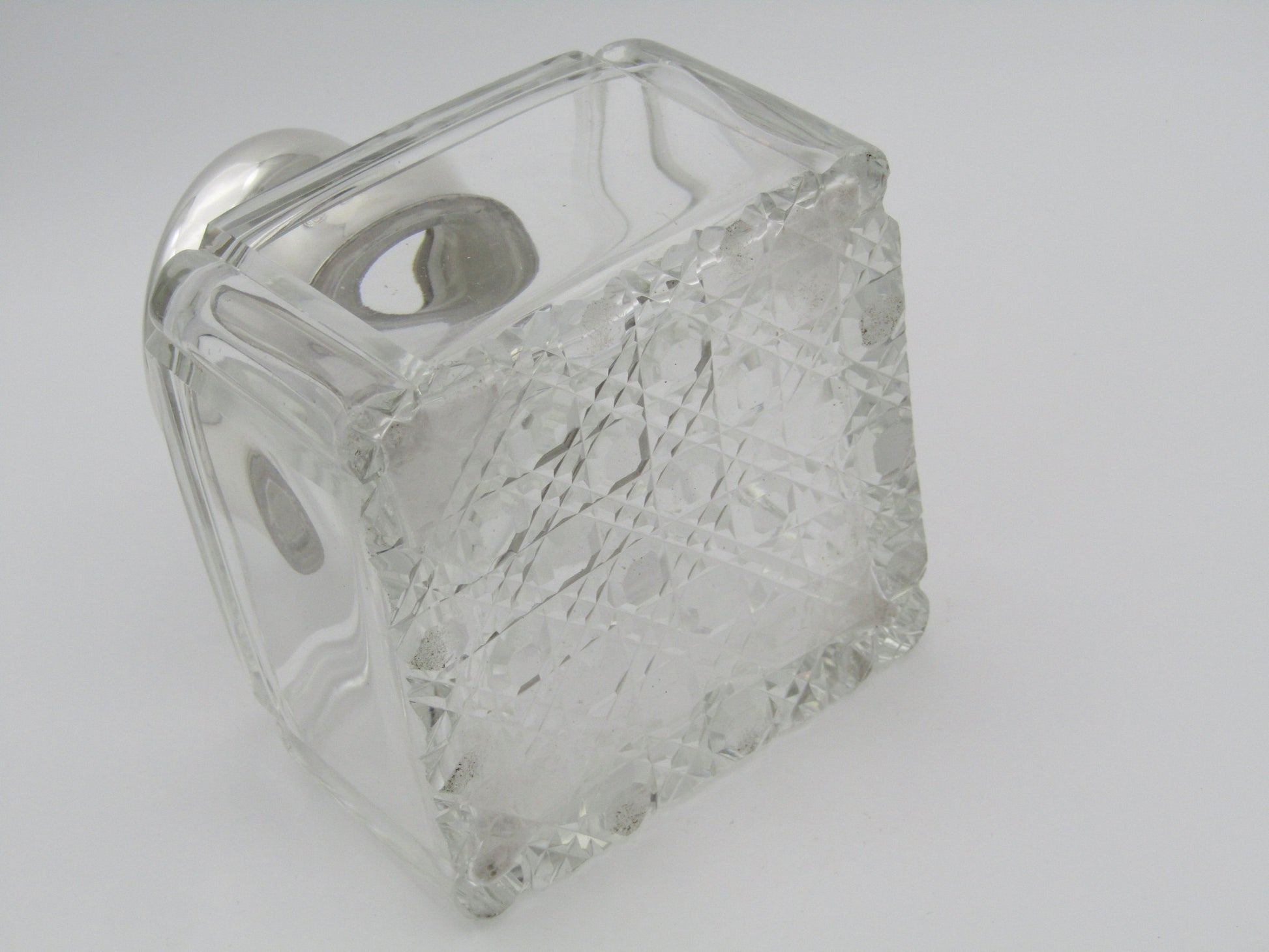 A silver mounted and cut glass desk inkwell by Asprey & Co. Ltd, Birmingham, 1915.