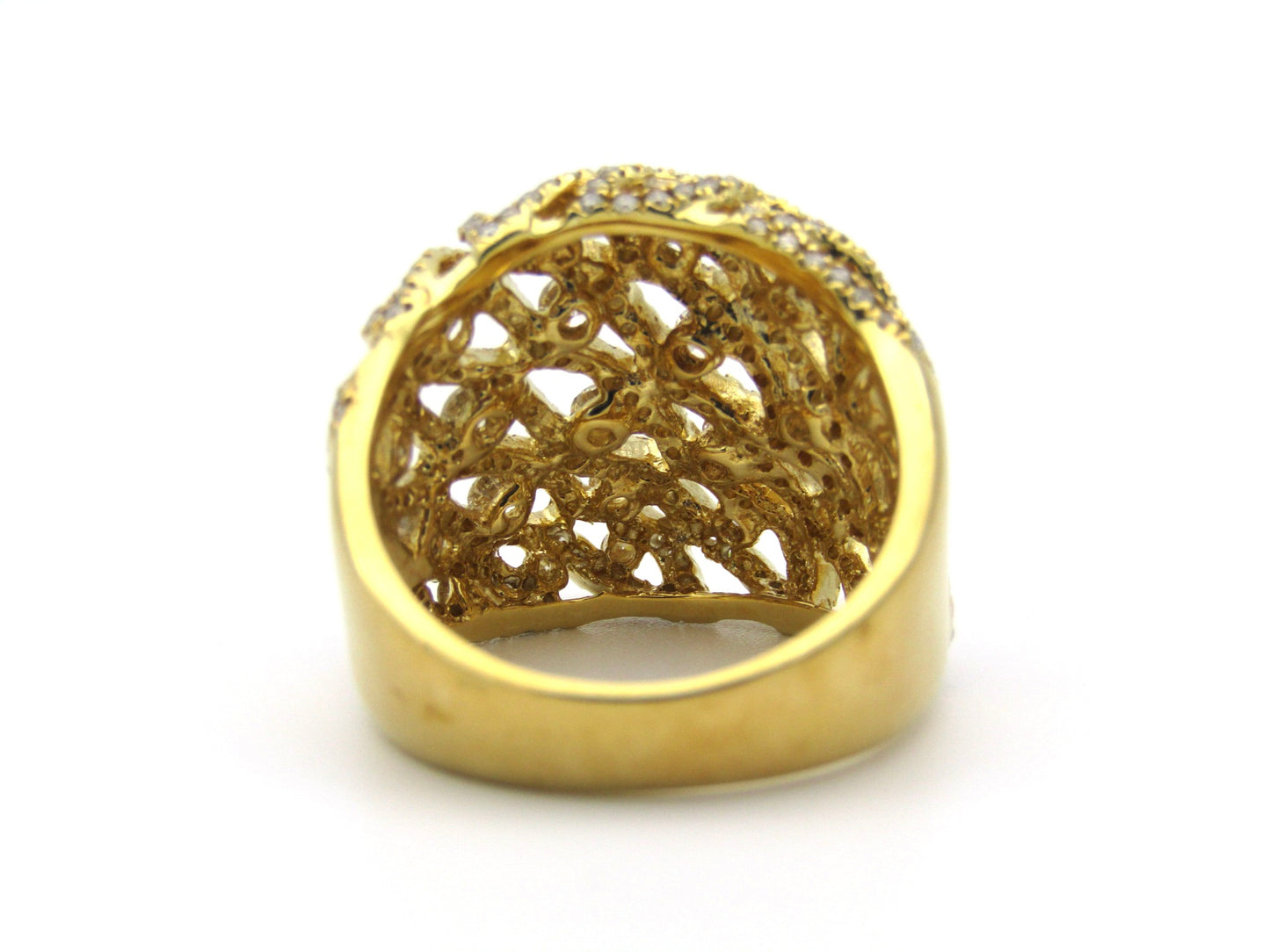 18K gold diamond dress ring.