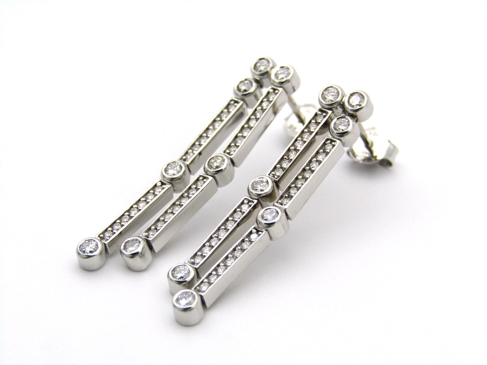 18K gold diamond drop earrings.