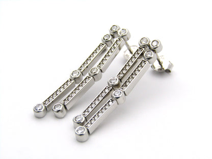 18K gold diamond drop earrings.