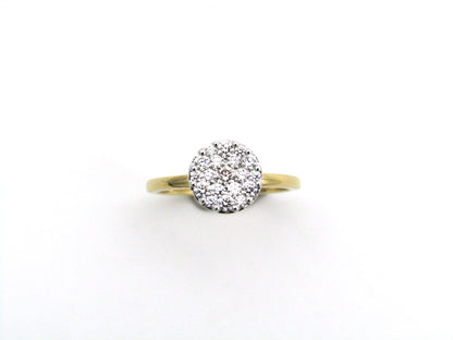 18K gold diamond cluster ring.