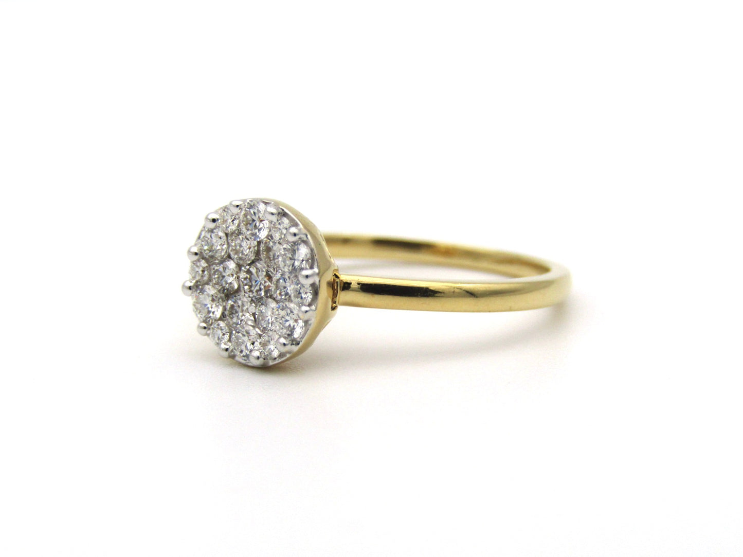 18K gold diamond cluster ring.
