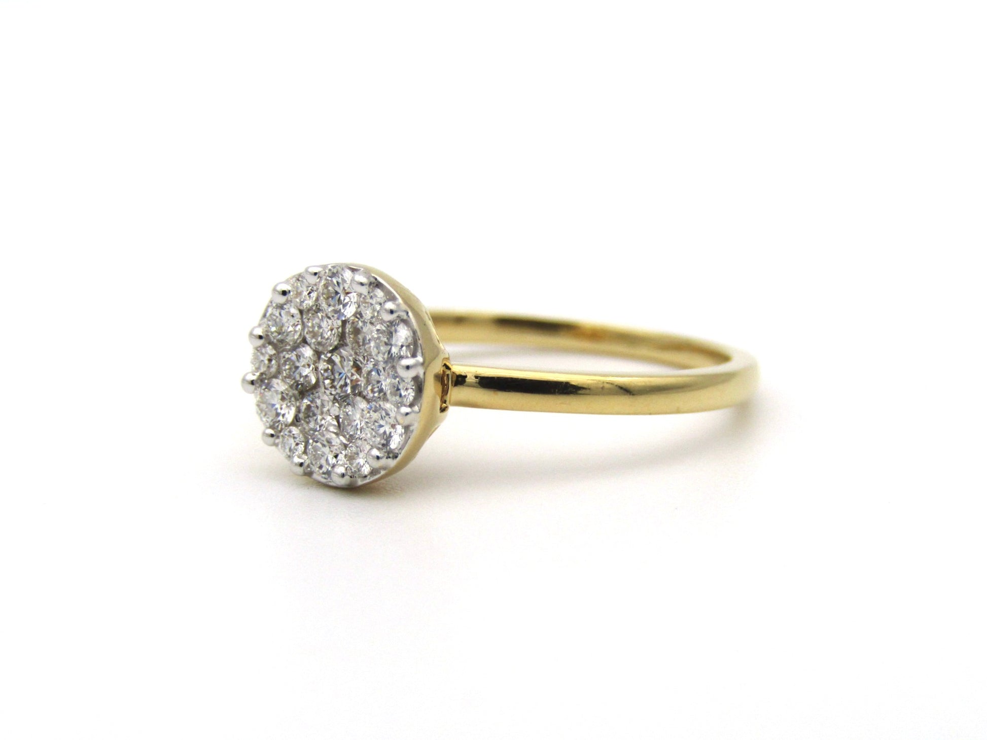 18K gold diamond cluster ring.