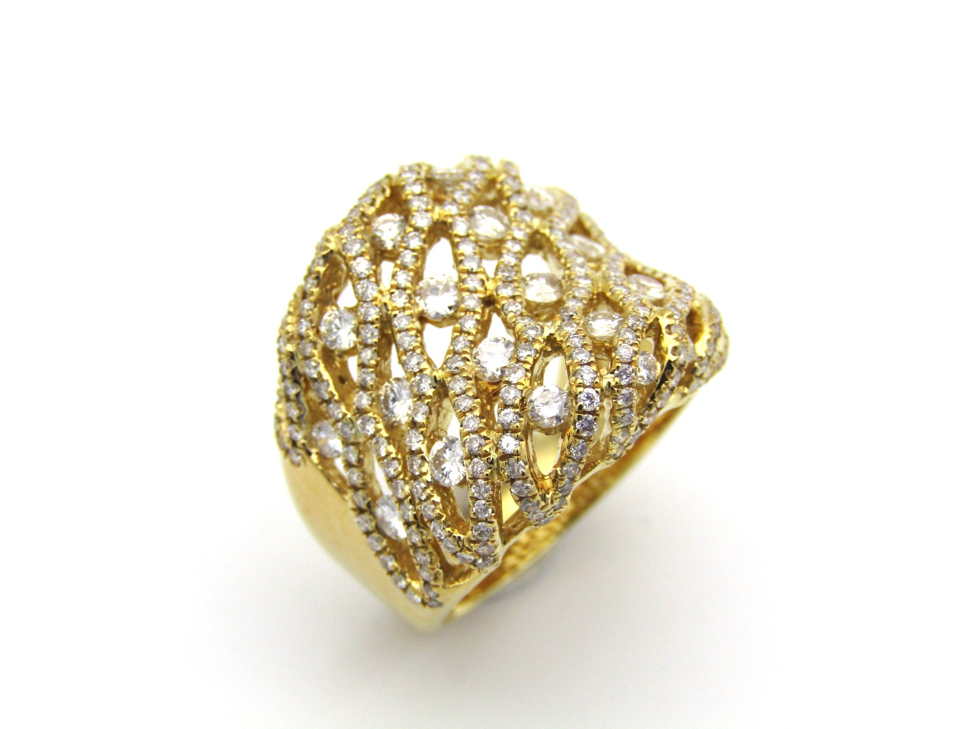 18K gold diamond dress ring.