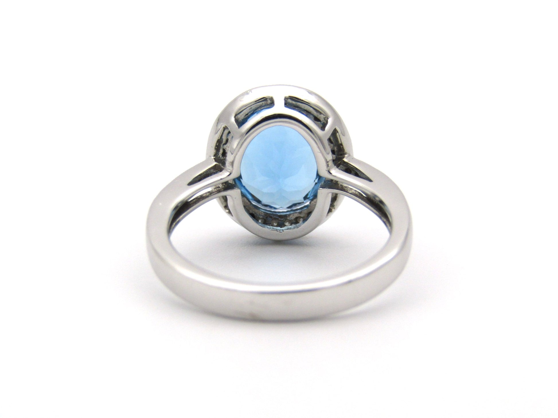 14K gold blue topaz and diamond ring.