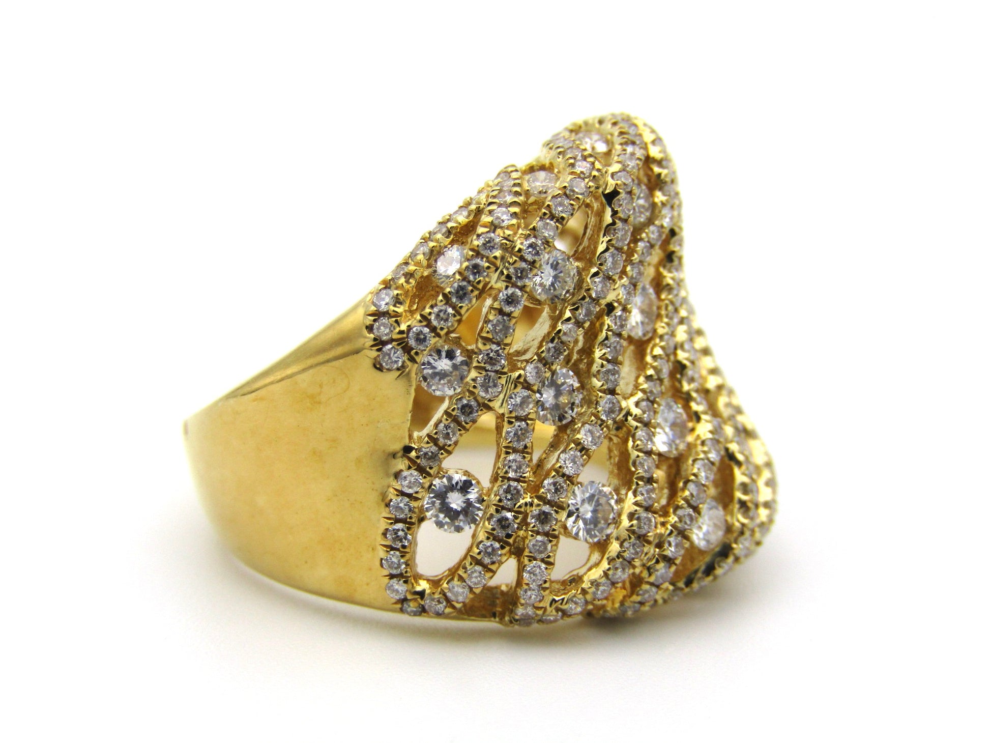 18K gold diamond dress ring.