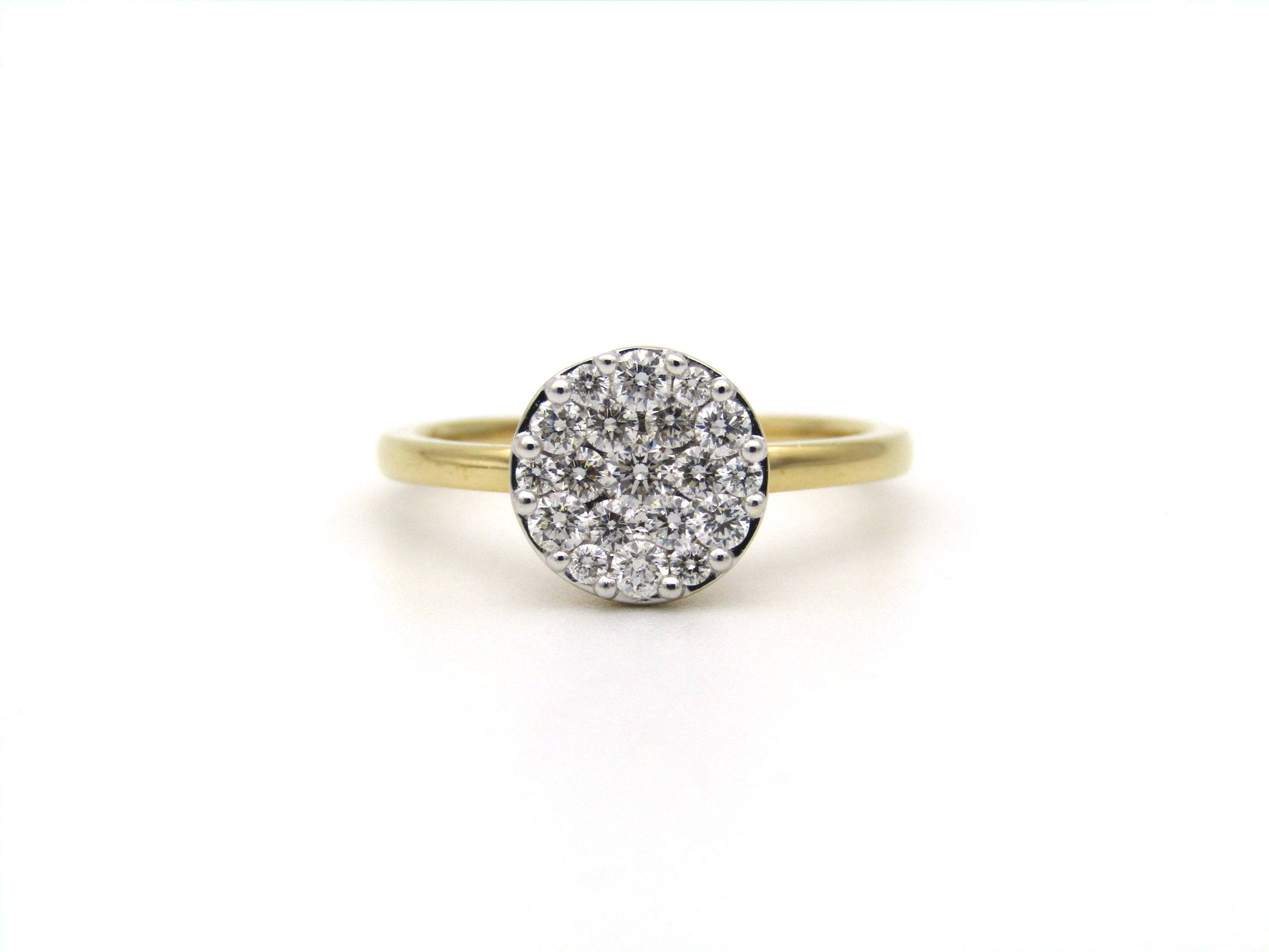 18K gold diamond cluster ring.