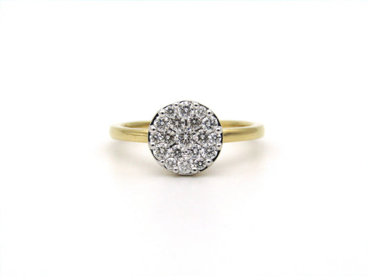 18K gold diamond cluster ring.