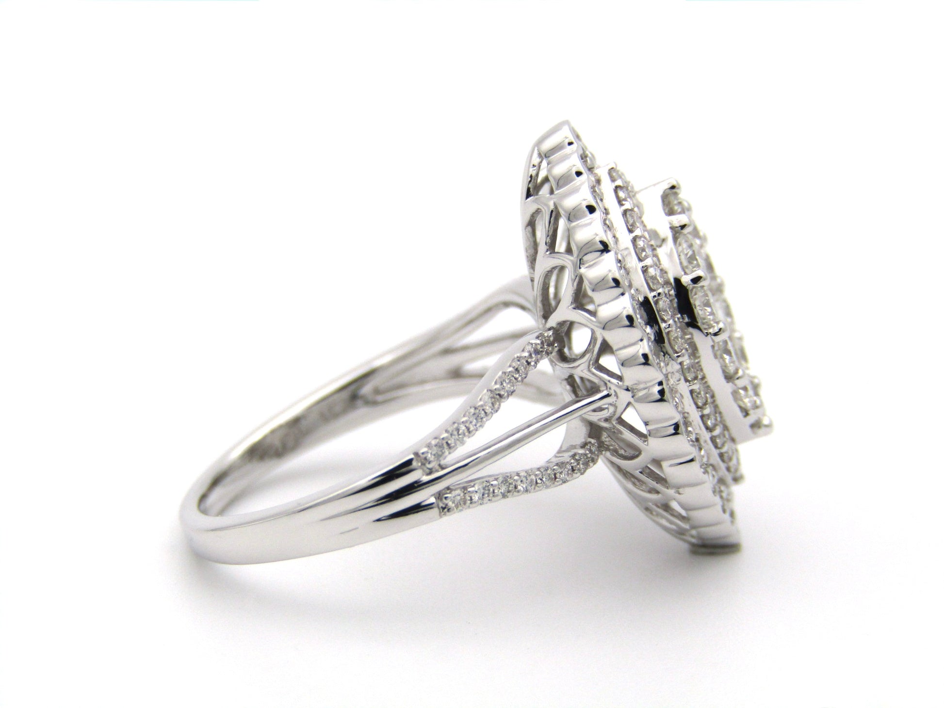 18K gold diamond cluster ring.
