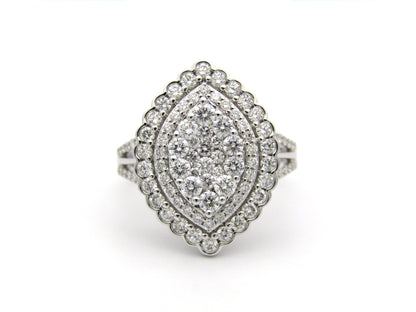 18K gold diamond cluster ring.