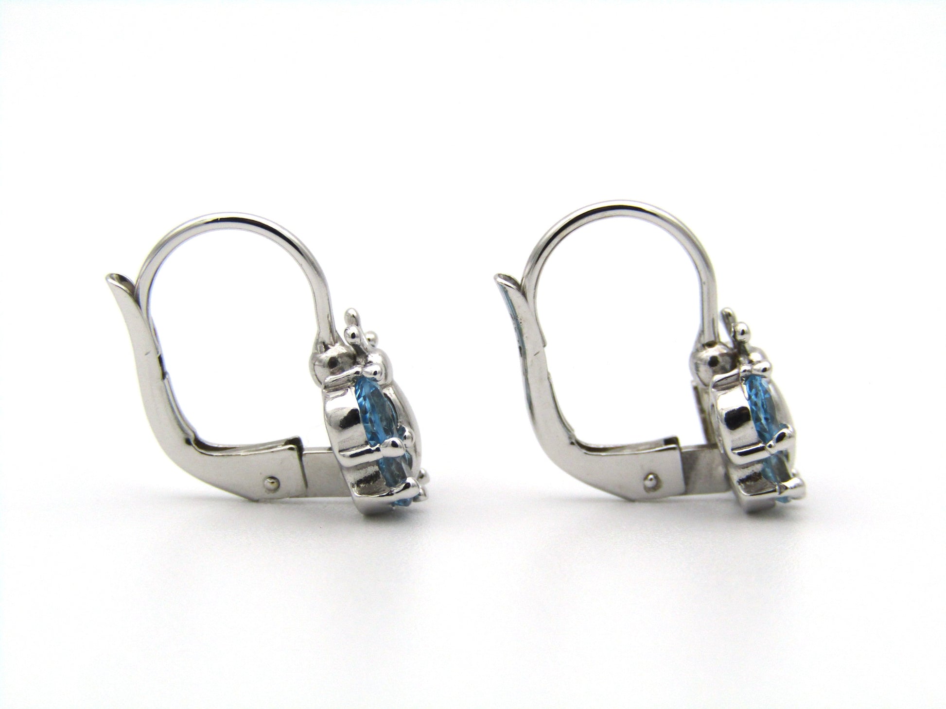 18K gold blue topaz butterfly earrings.