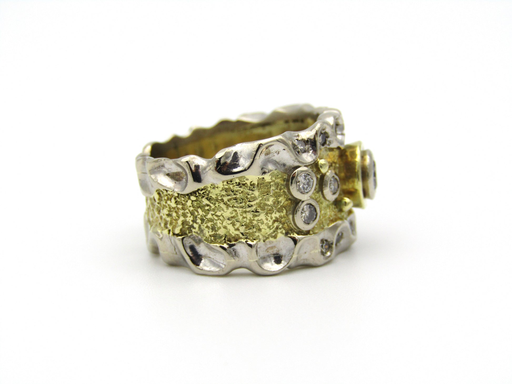 18kt gold diamond ring.