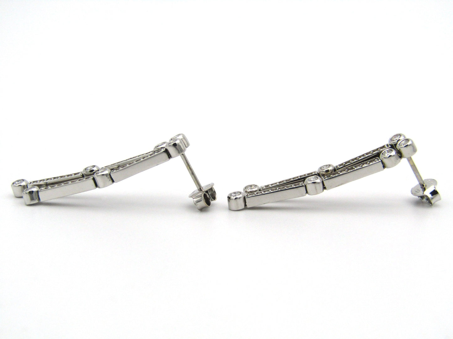18K gold diamond drop earrings.