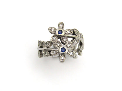 18K gold sapphire and diamond ring.