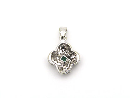 18K gold emerald and diamond pendant.