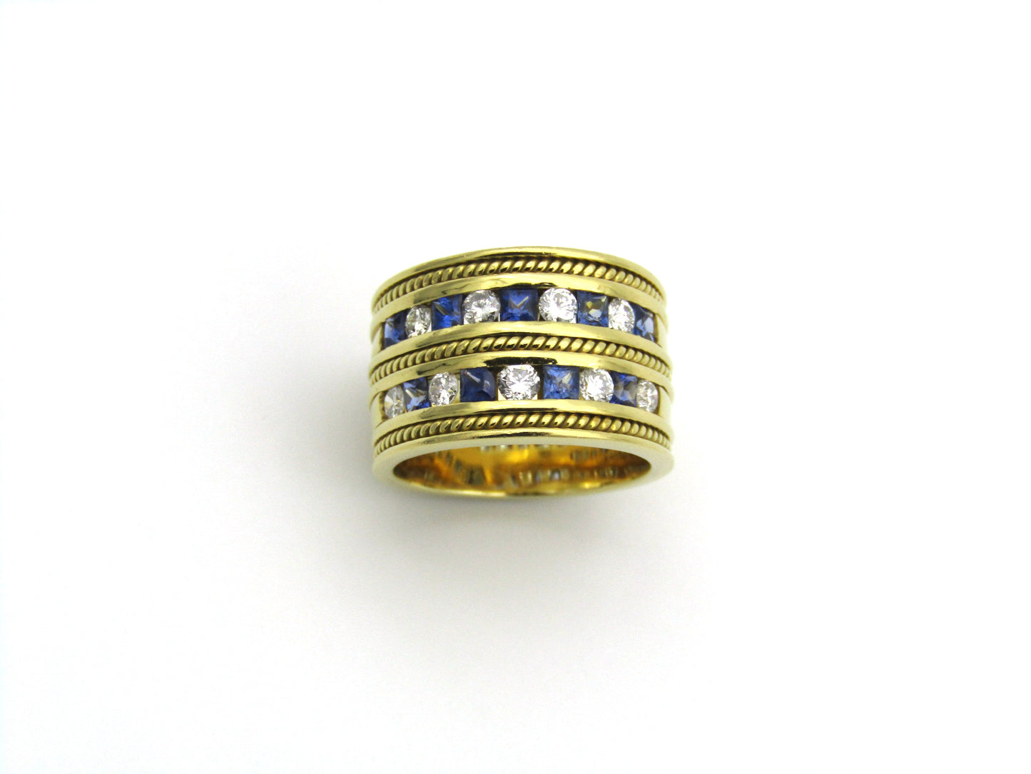 18K gold sapphire and diamond ring.