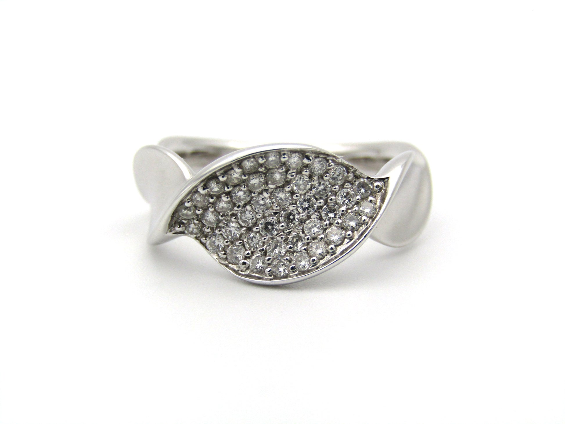 18K gold twist diamond ring.