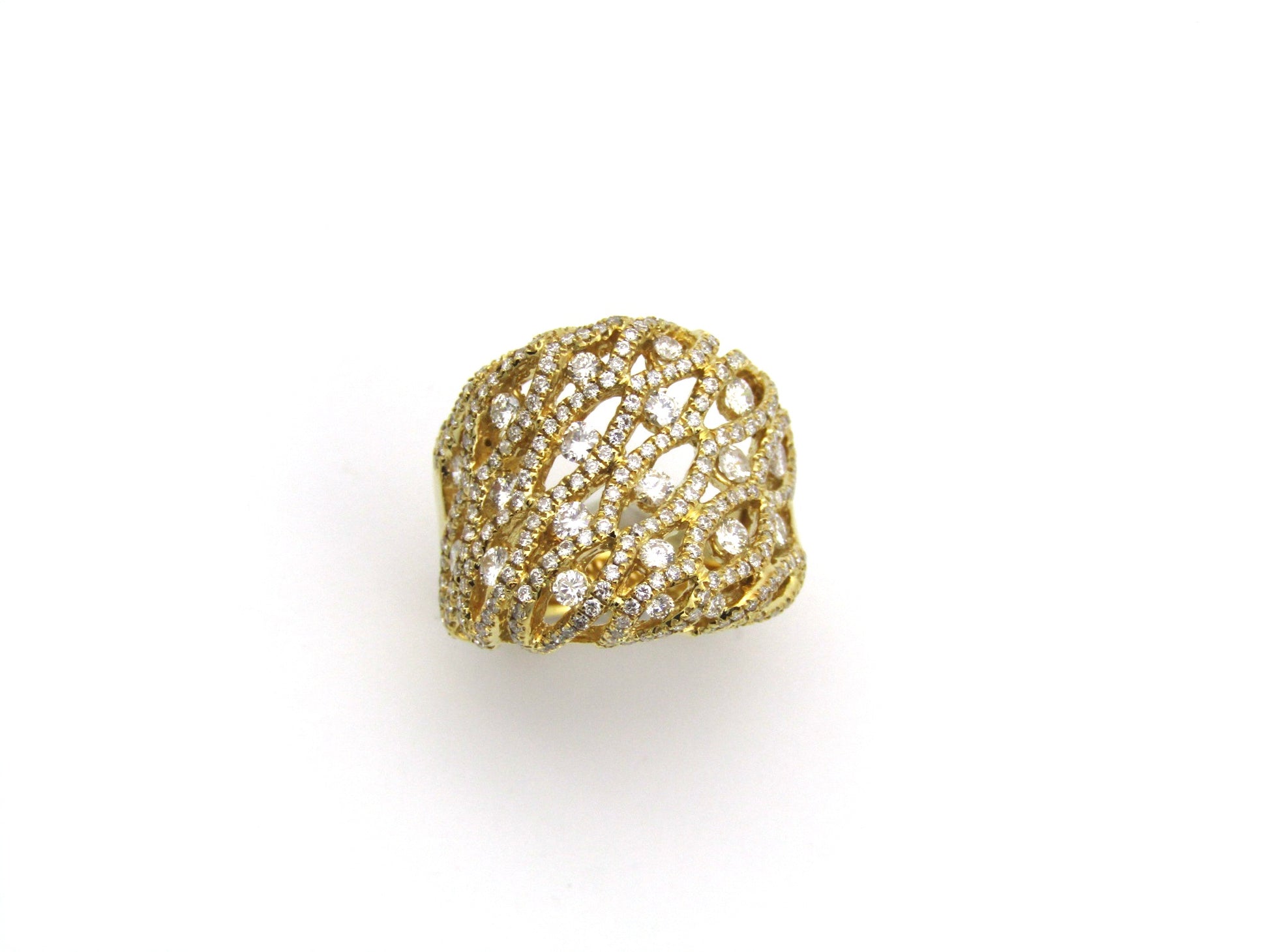 18K gold diamond dress ring.