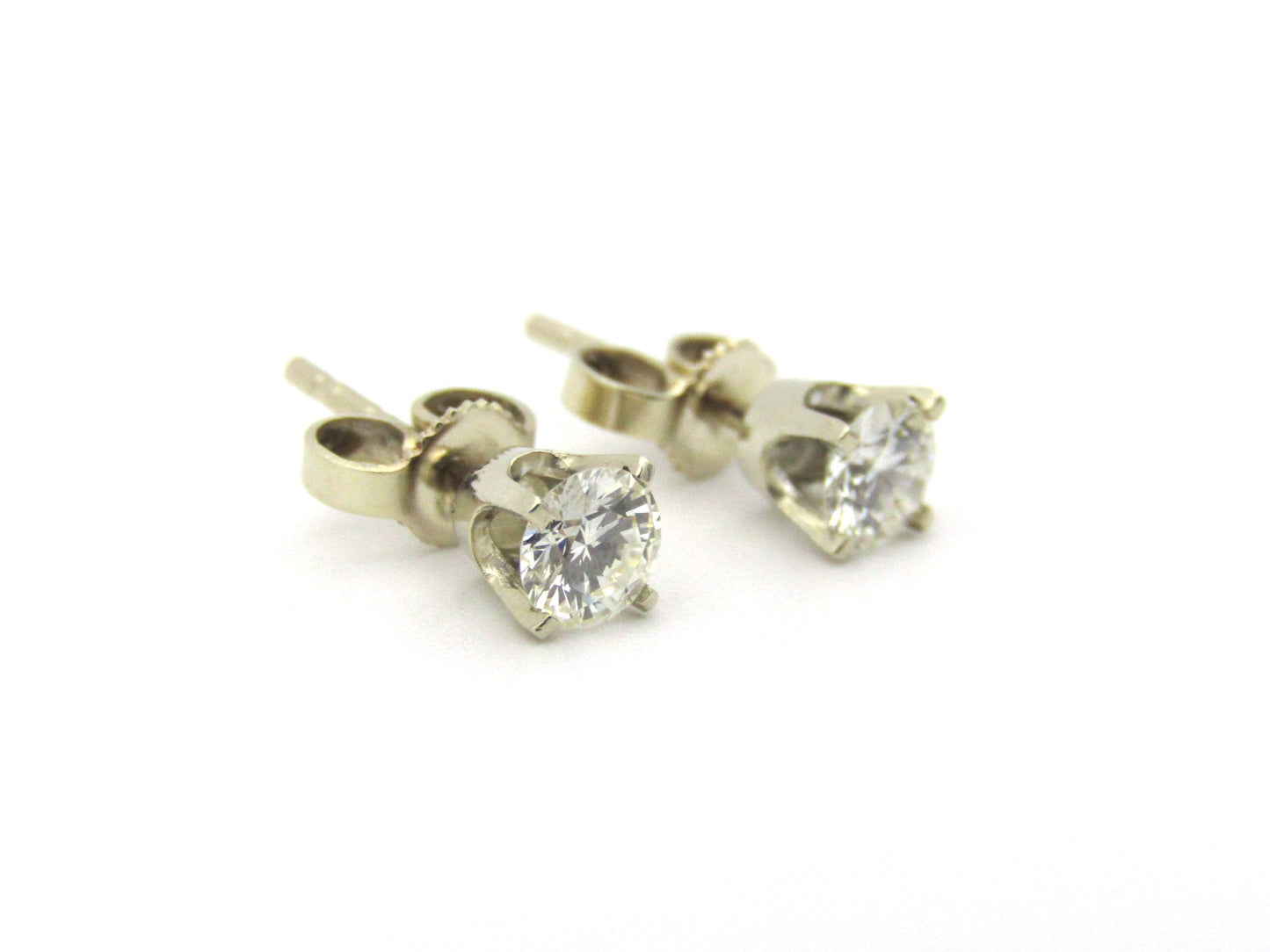 14K gold diamond studs.