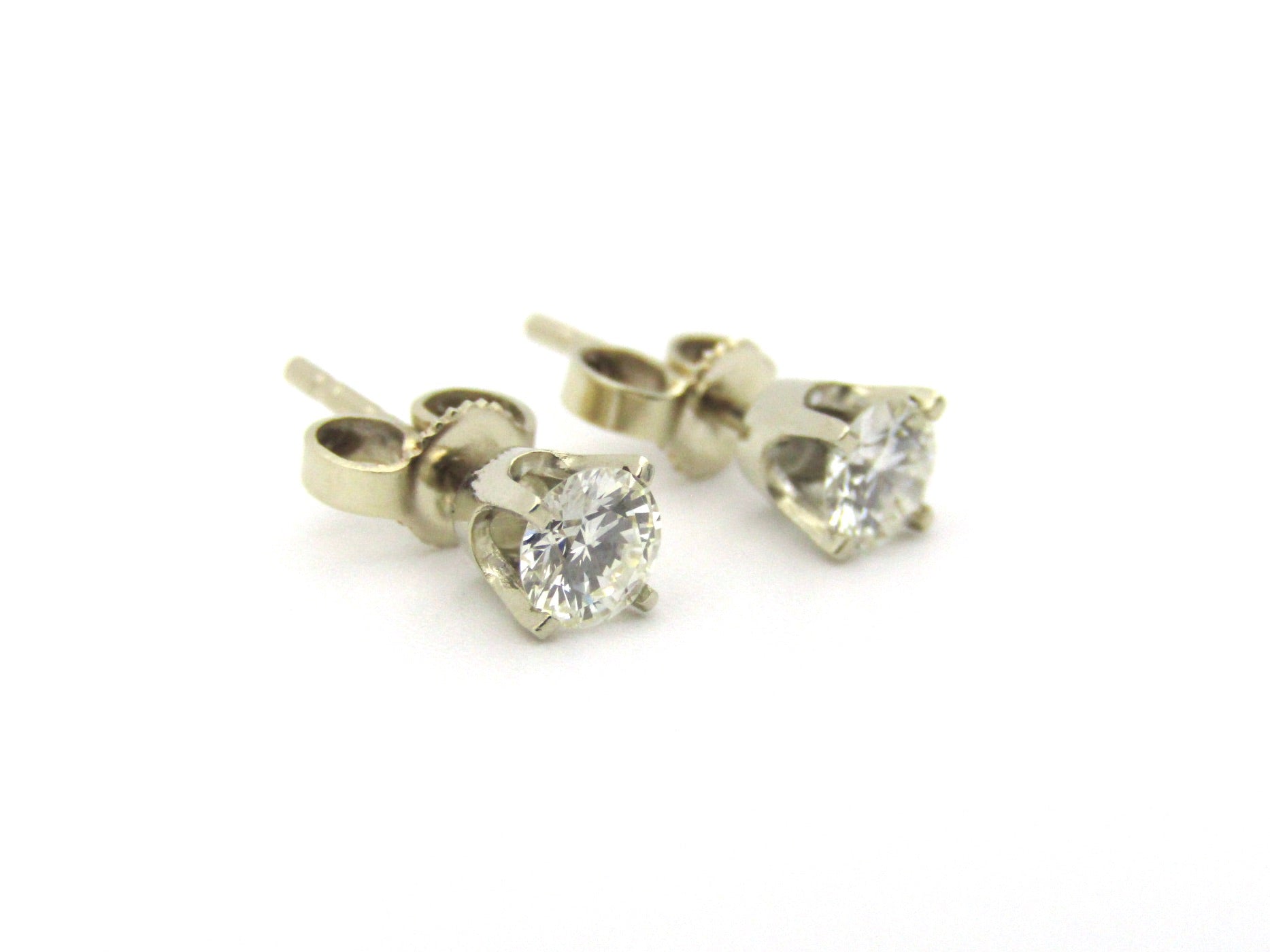 14K gold diamond studs.