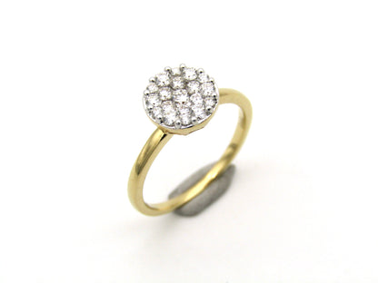 18K gold diamond cluster ring.