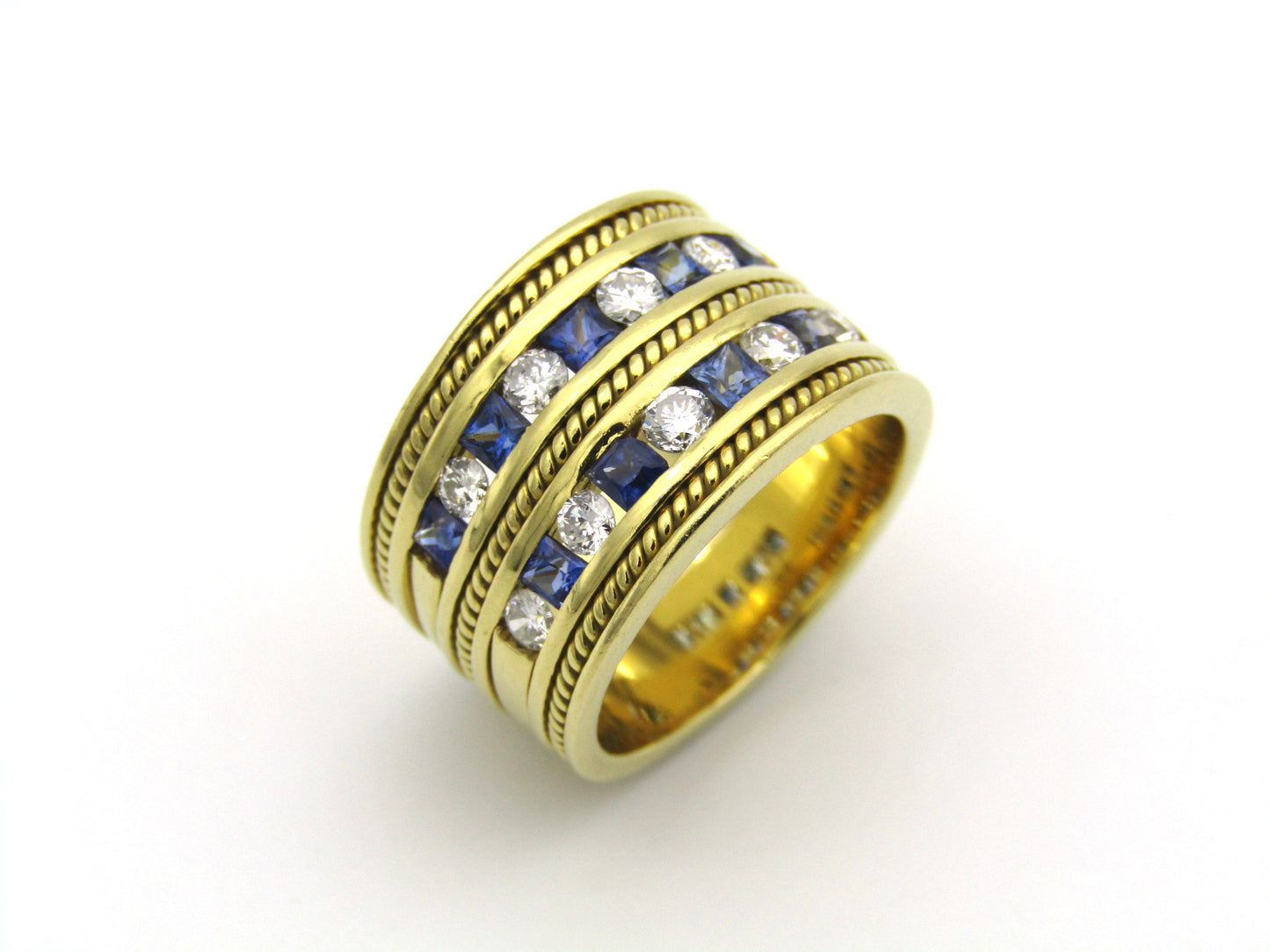 18K gold sapphire and diamond ring.