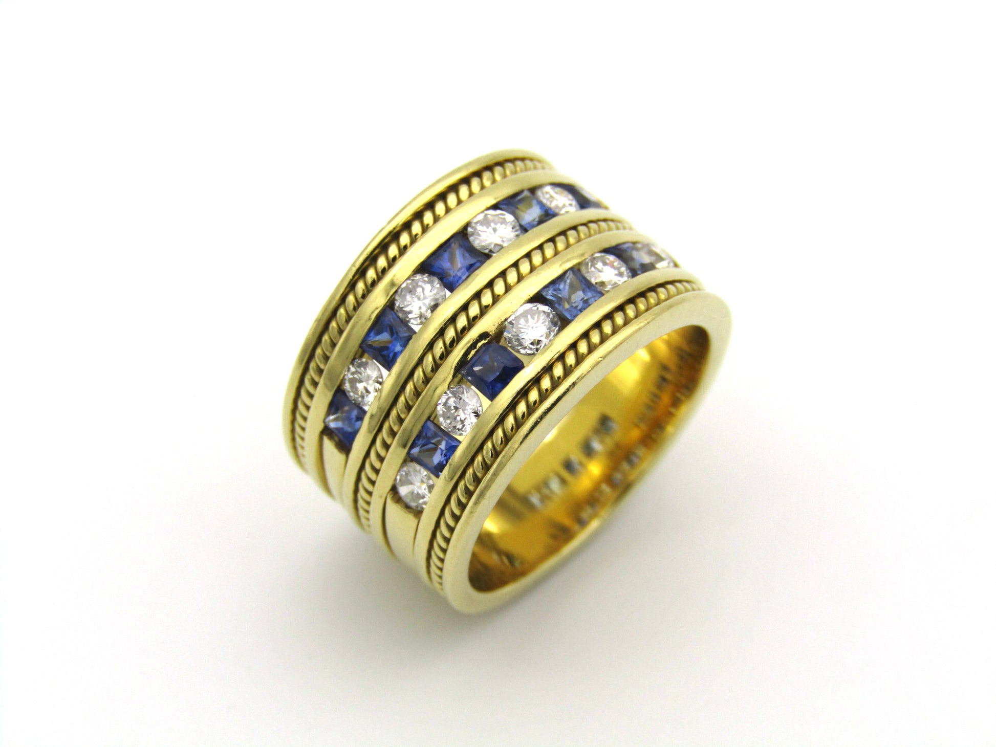 18K gold sapphire and diamond ring.