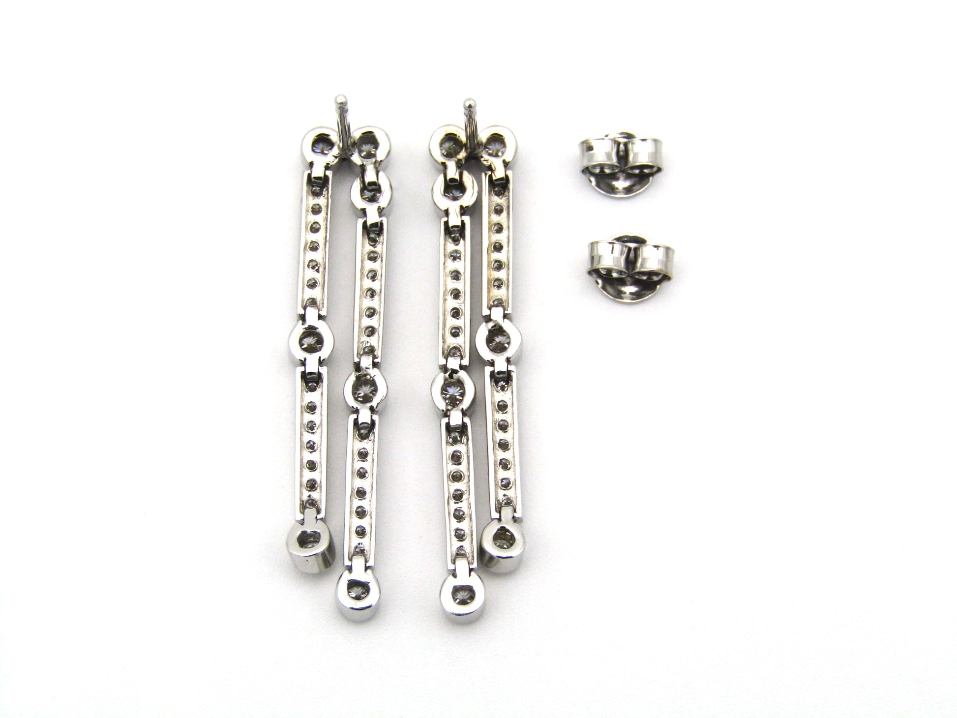 18K gold diamond drop earrings.