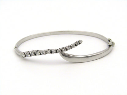 18K white gold diamond bangle.