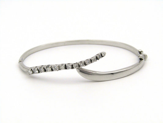 18K white gold diamond bangle.