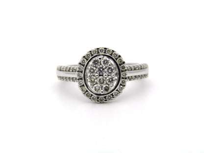 14K gold diamond ring.