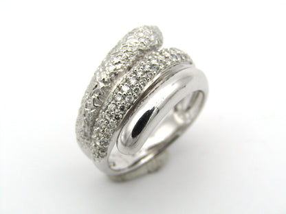 9K gold diamond twist ring.