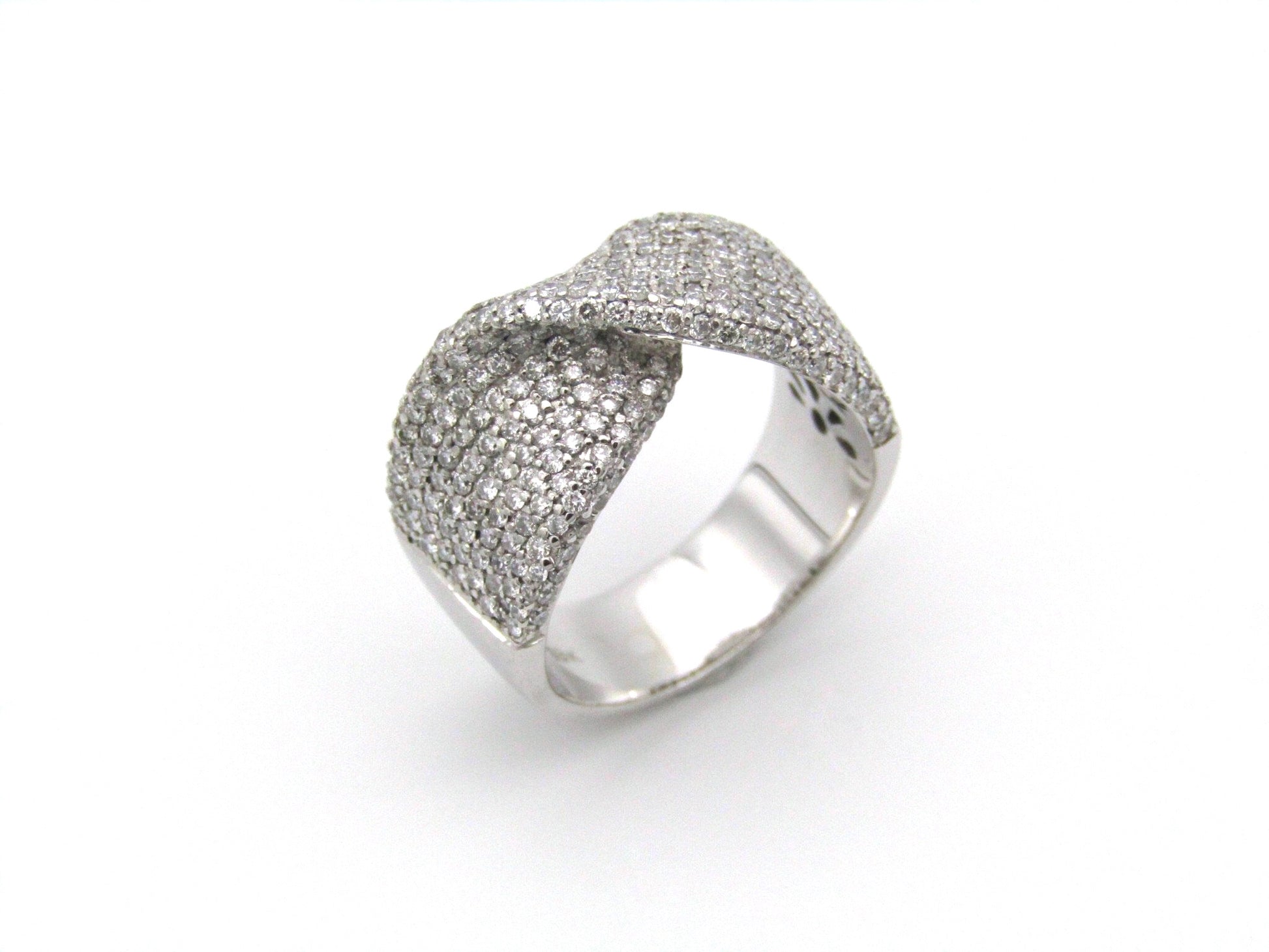 18K white gold diamond twist ring.