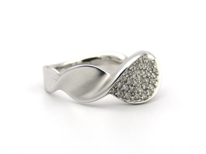 18K gold twist diamond ring.