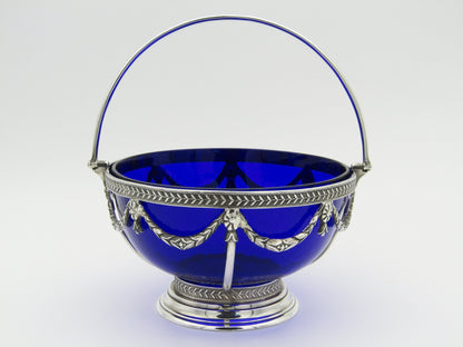 A Victorian silver sugar basket by Horace Woodward & Co., Birmingham, 1881.