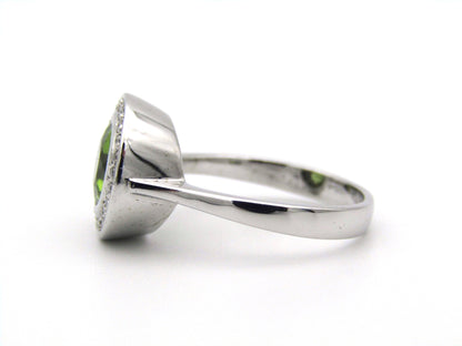 9kt gold peridot and diamond ring.