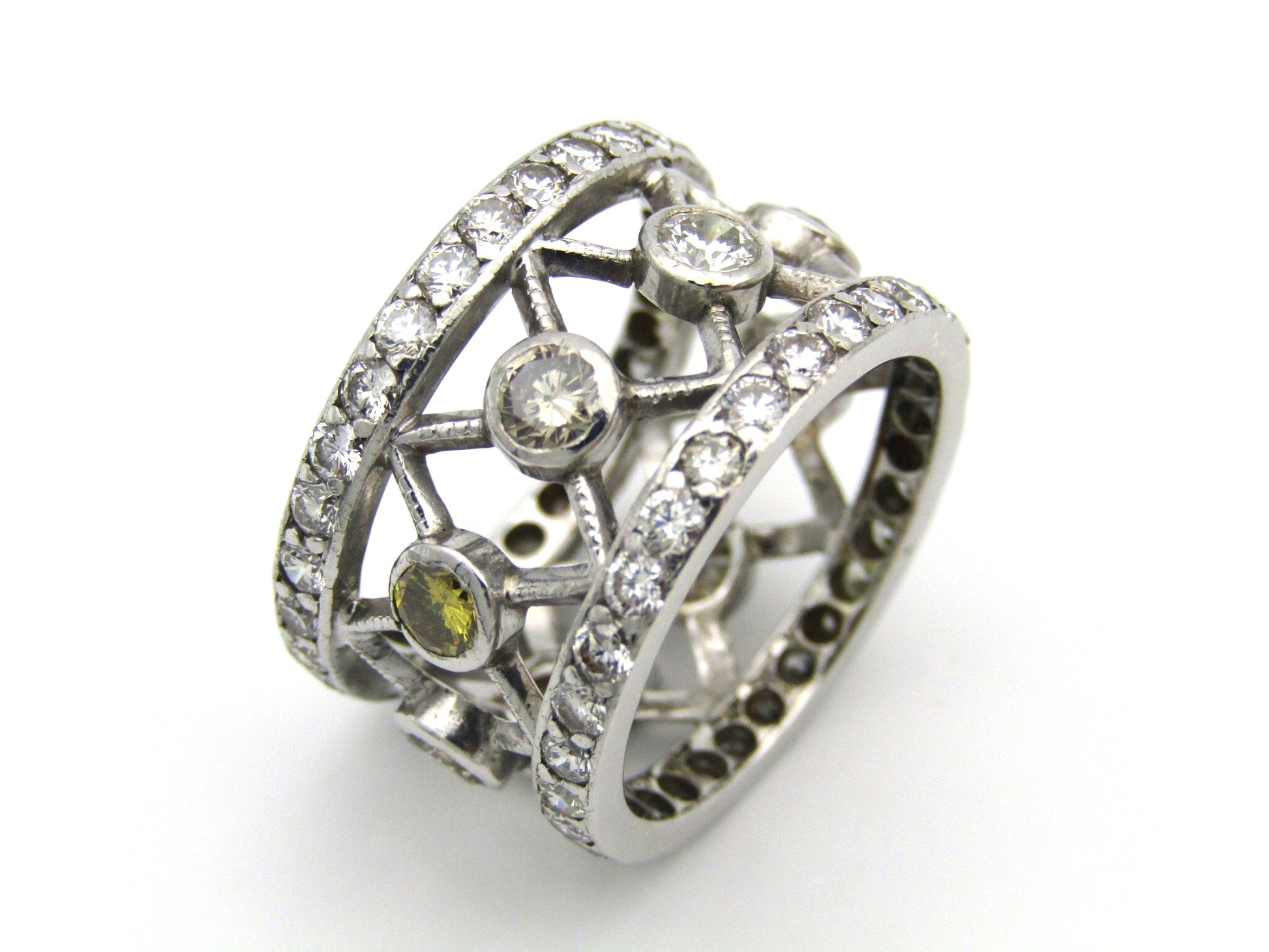 9kt gold fancy and colourless diamond ring.