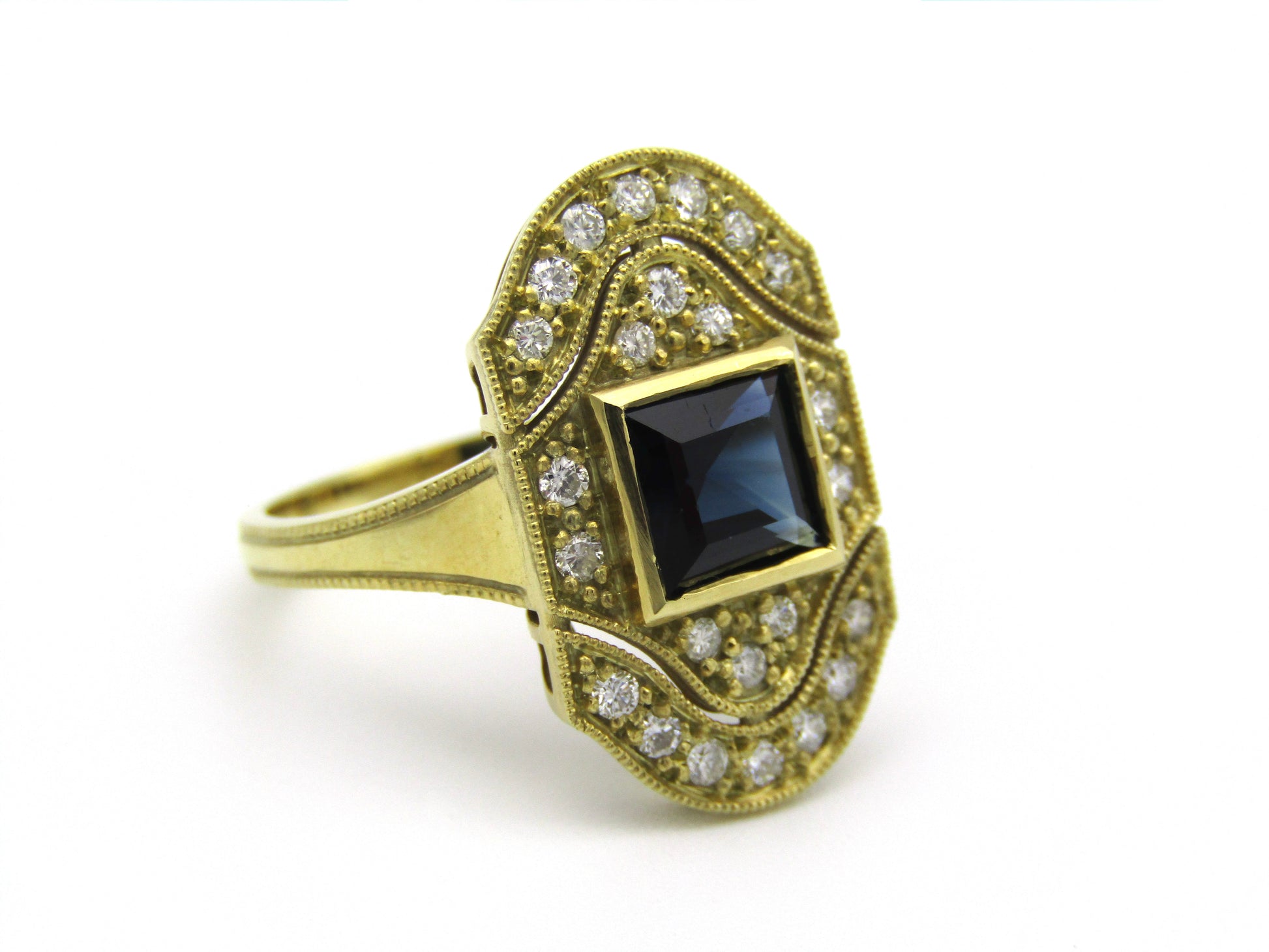 14K gold Art Deco style sapphire and diamond ring.