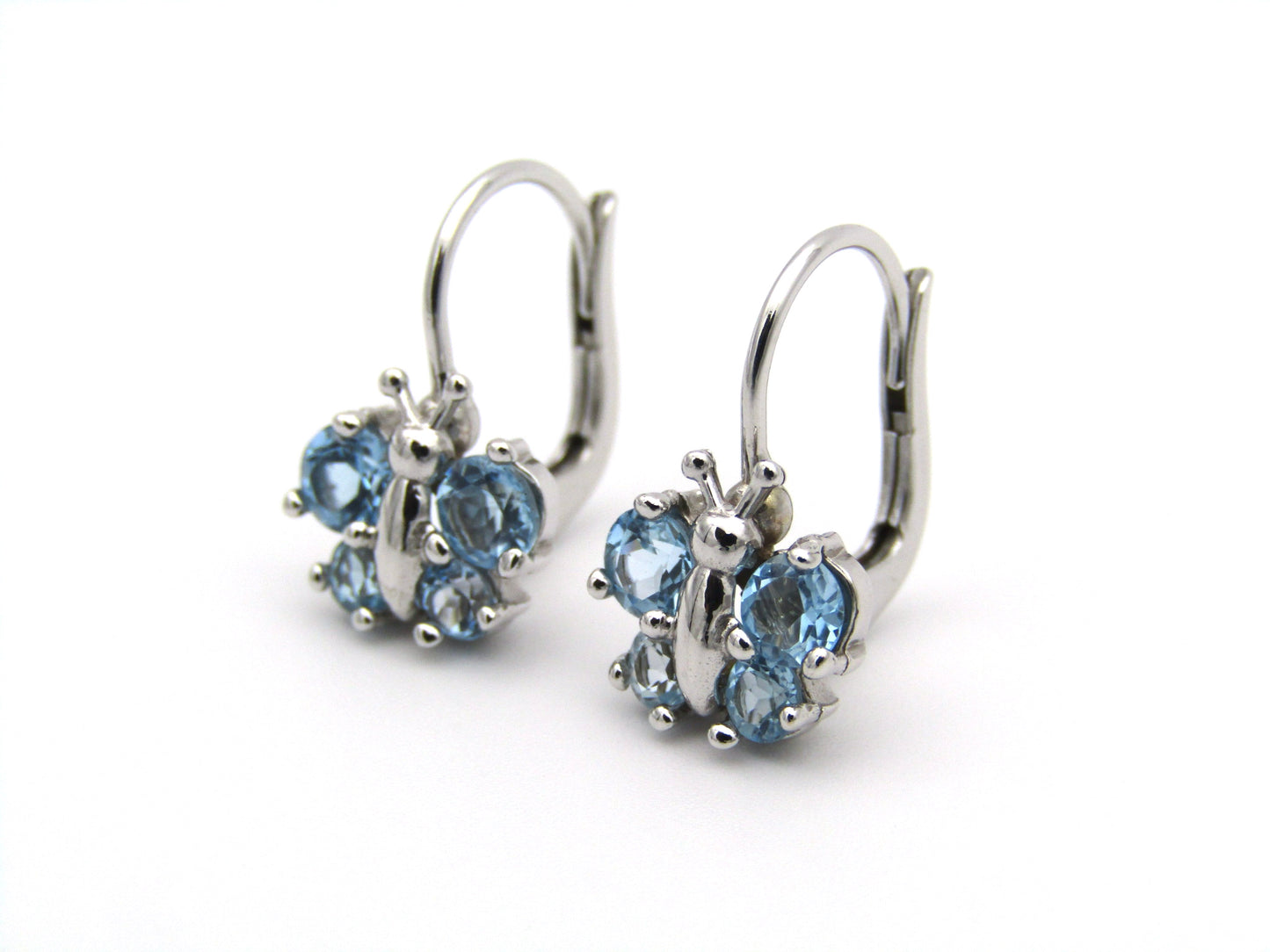 18K gold blue topaz butterfly earrings.