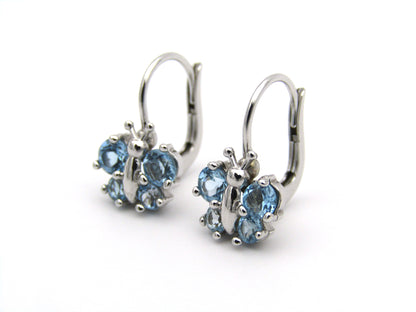 18K gold blue topaz butterfly earrings.