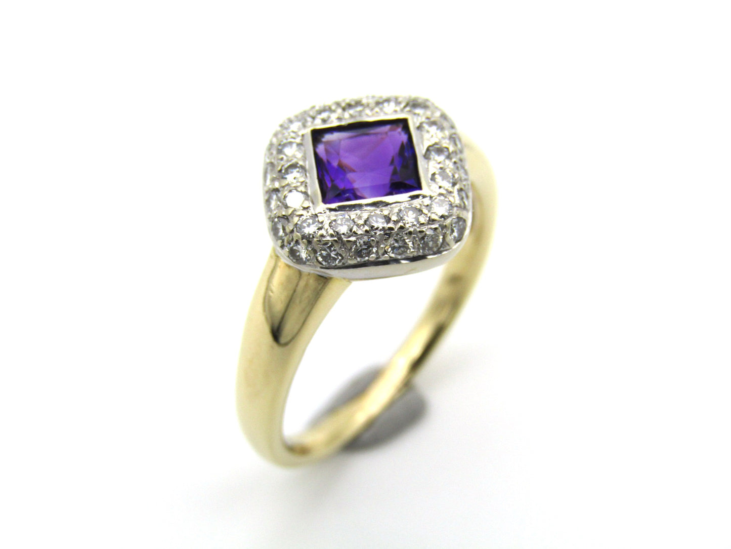 18K gold amethyst and diamond ring.